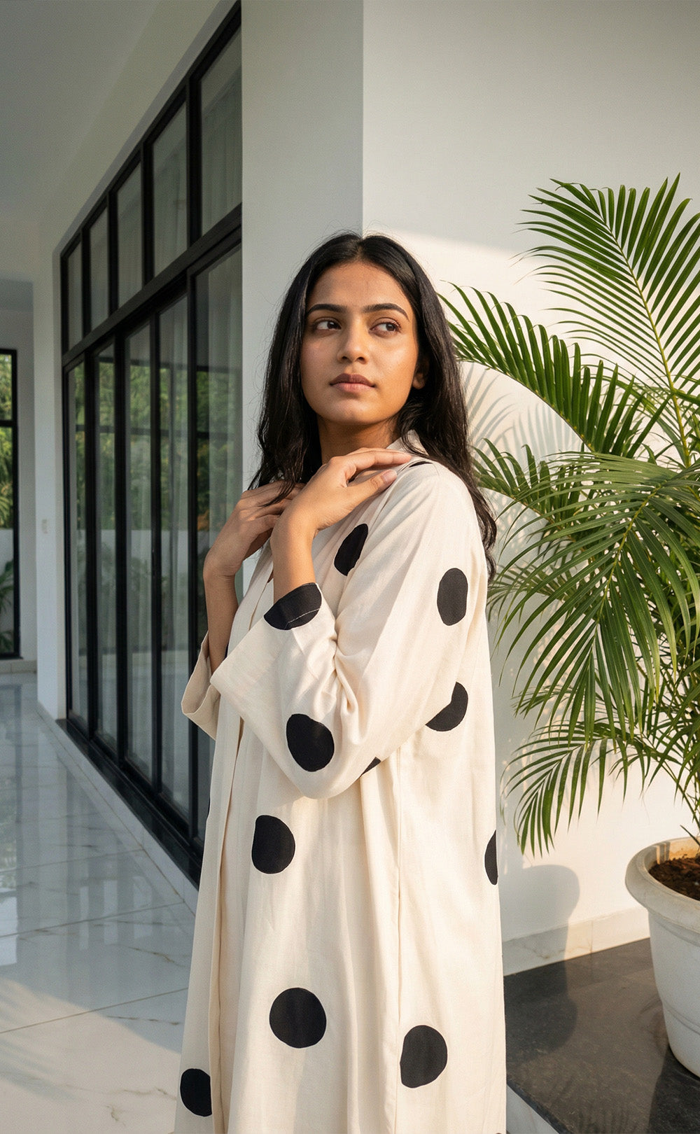 Half White Rayon All-Over Bold Black Dots Print Front Buttons Straight Kurti
