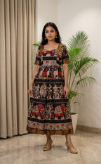 Masriser Black Kalamkari Panel printed Kurti Gown with contrast Golden Border work