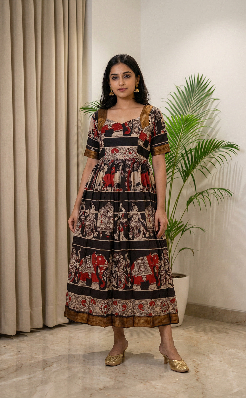 Masriser Black Kalamkari Panel printed Kurti Gown with contrast Golden Border work