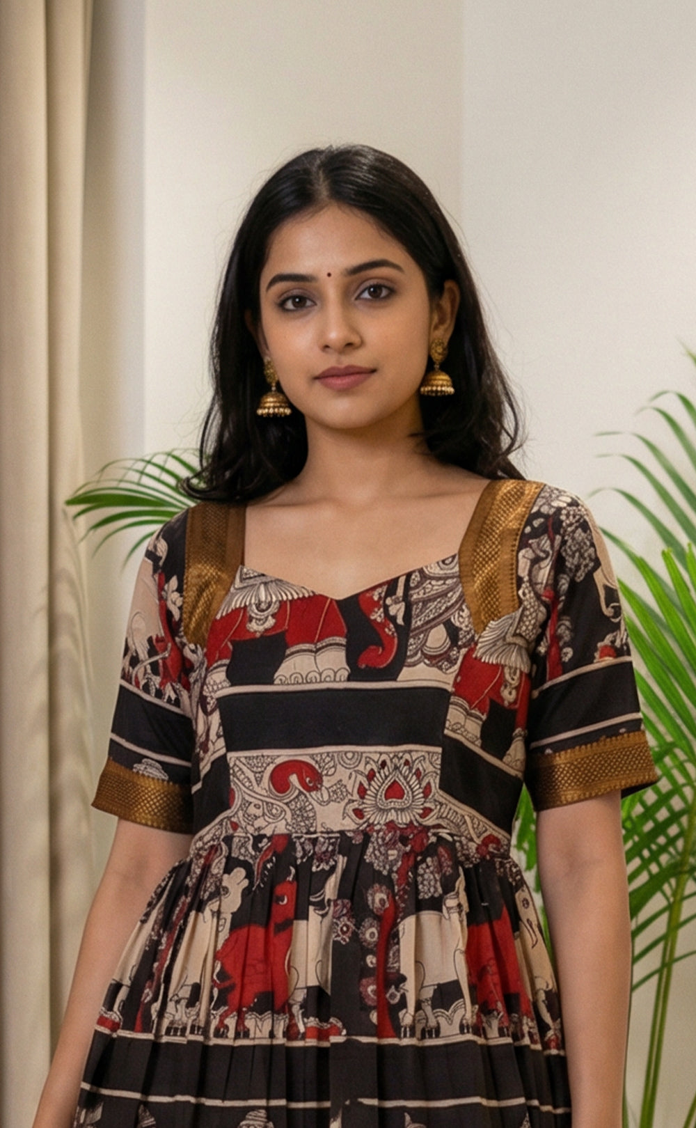 Masriser Black Kalamkari Panel printed Kurti Gown with contrast Golden Border work