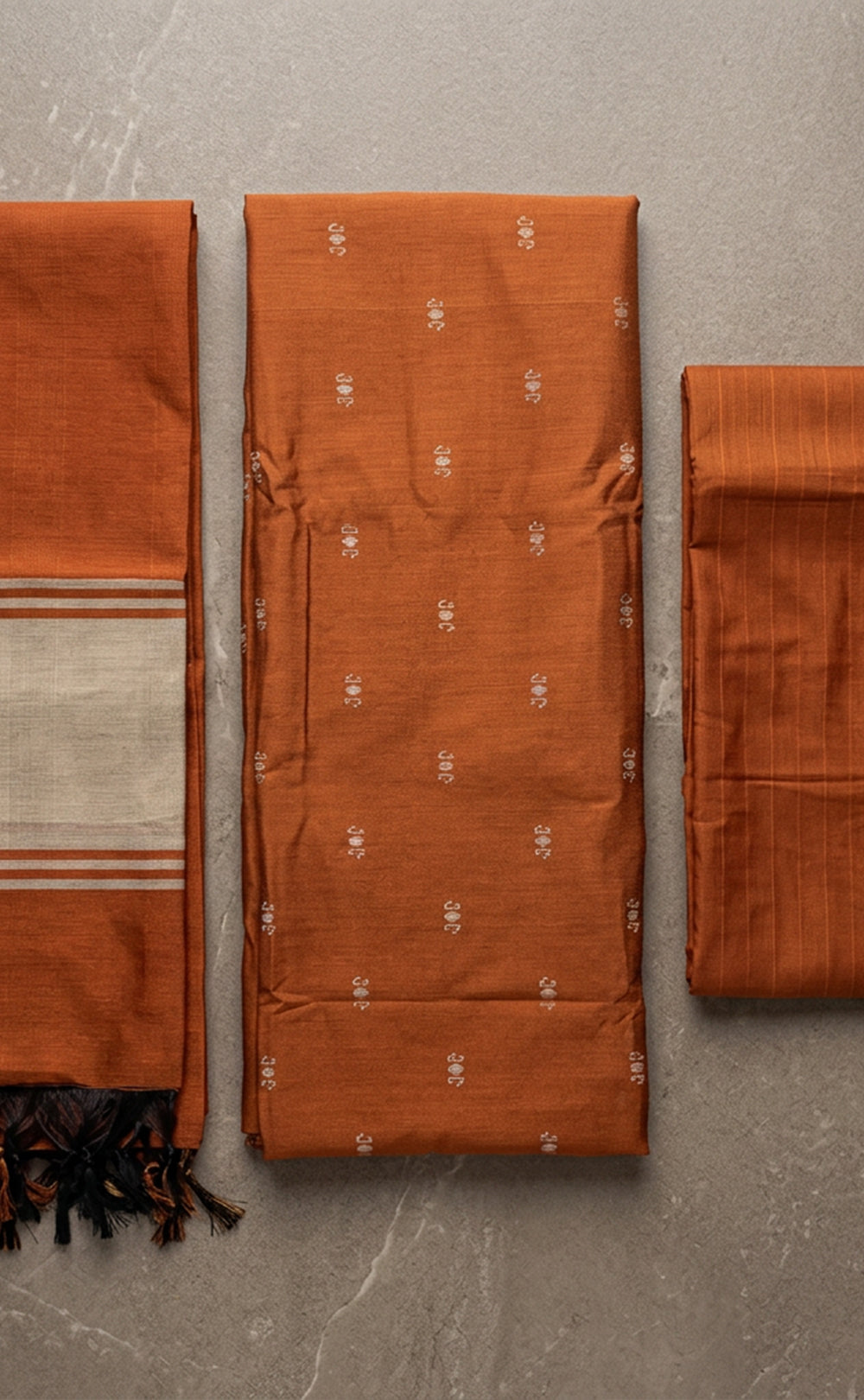 Rust Orange Fancy Ikkat Buti Work Un-Stitched Dress Material
